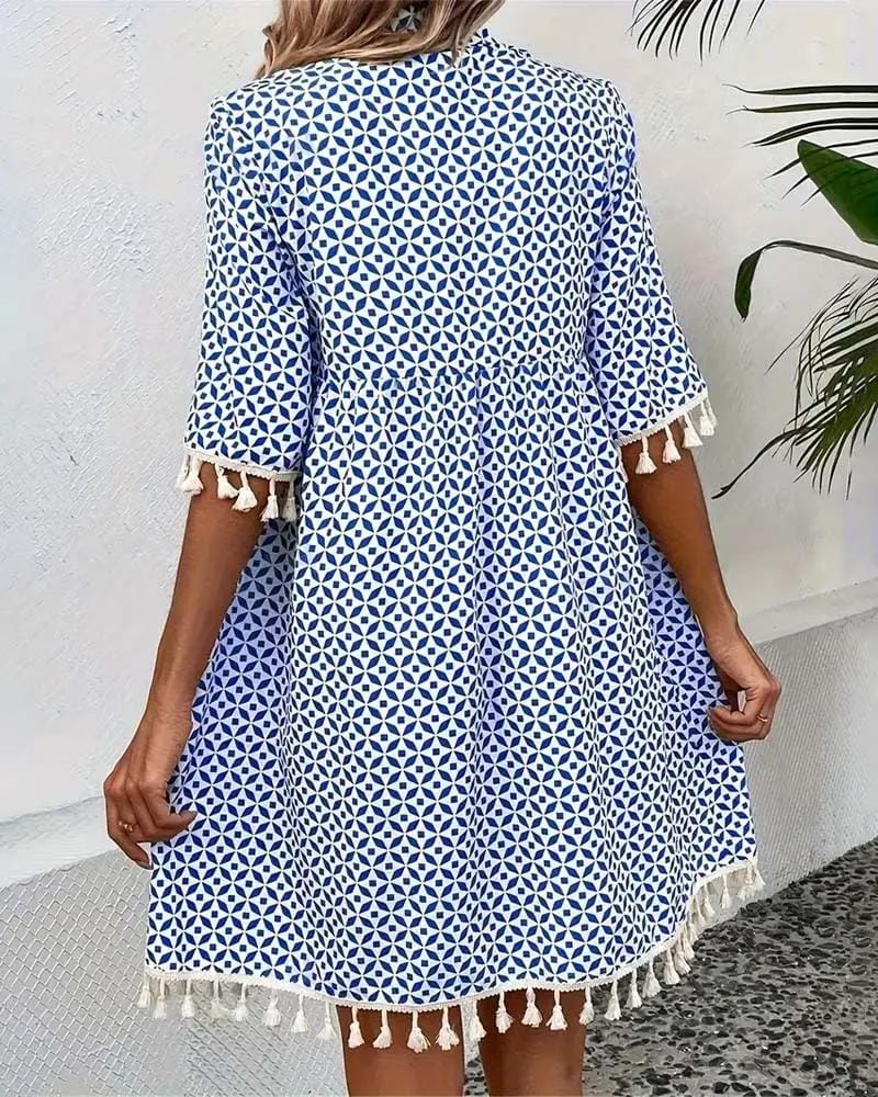 Emma | Élégante Mini-Robe Géométrique à Pompons 1